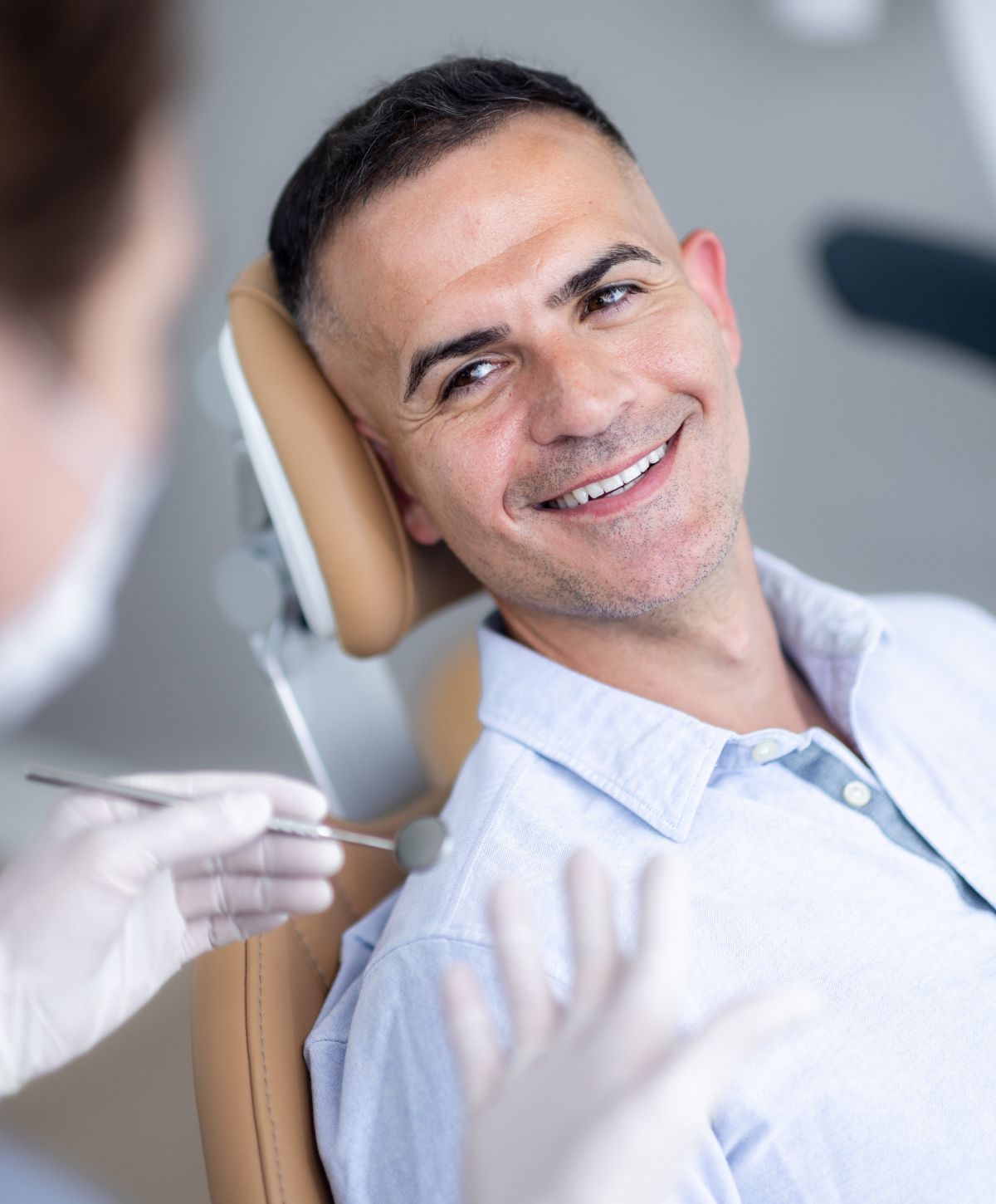 clark cosmetic dentistry patient sitting in chair